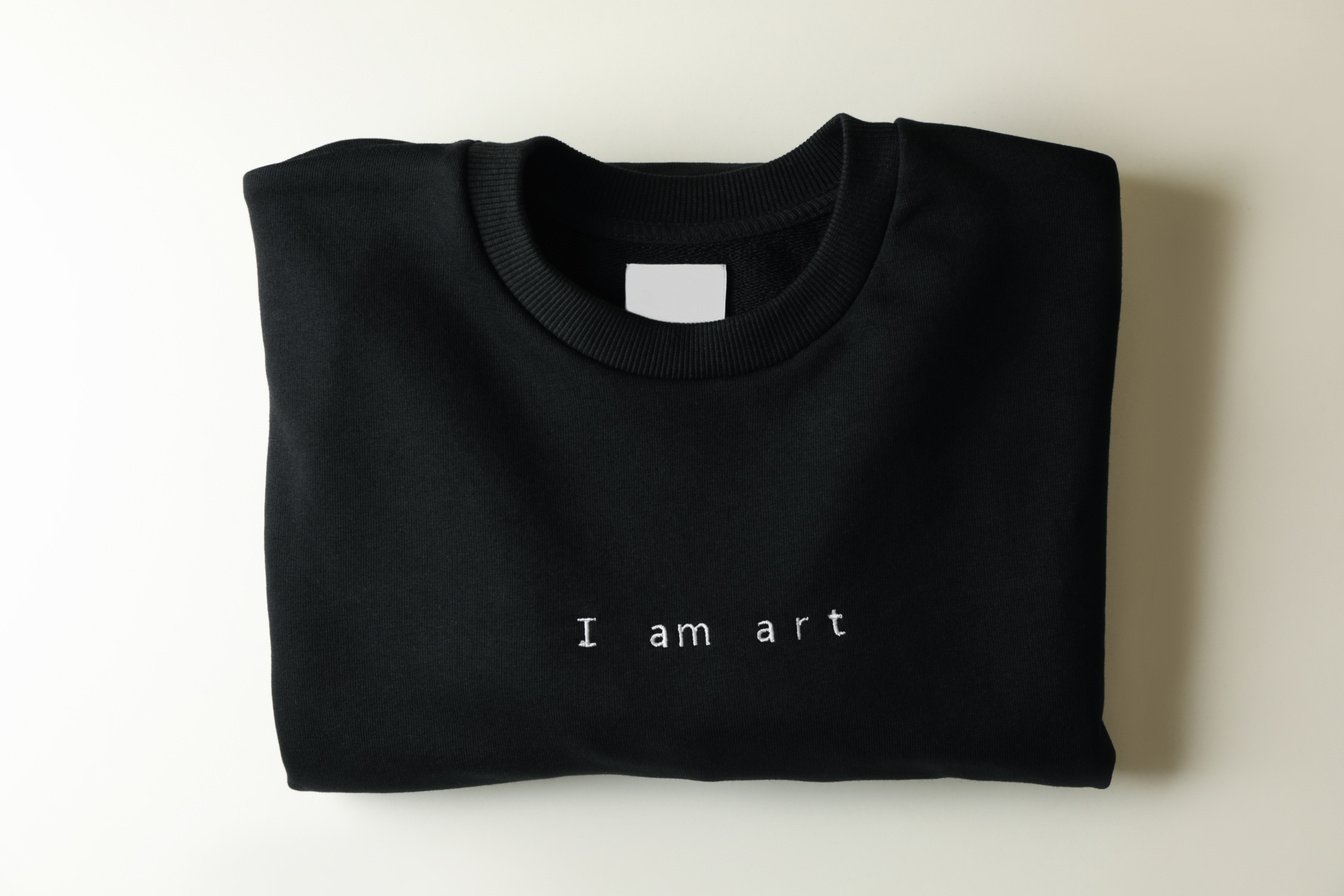 Stylish Blank Black Sweatshirt on White Table